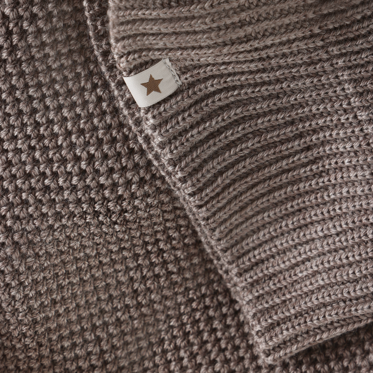 Cagoule coupe-vent Huttelihut à pompons